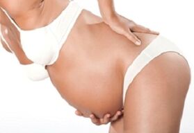 Bassa il dolore alla ragazza durante la gravidanza